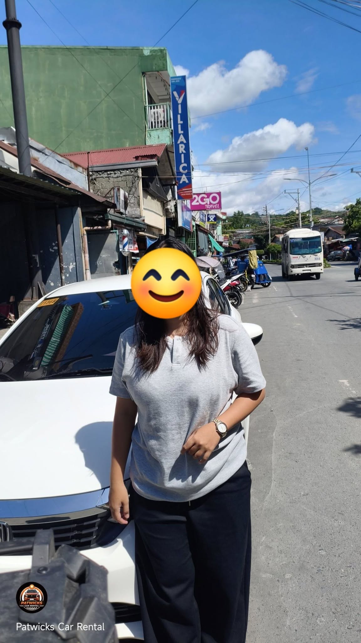 Happy customer with rented vehicle