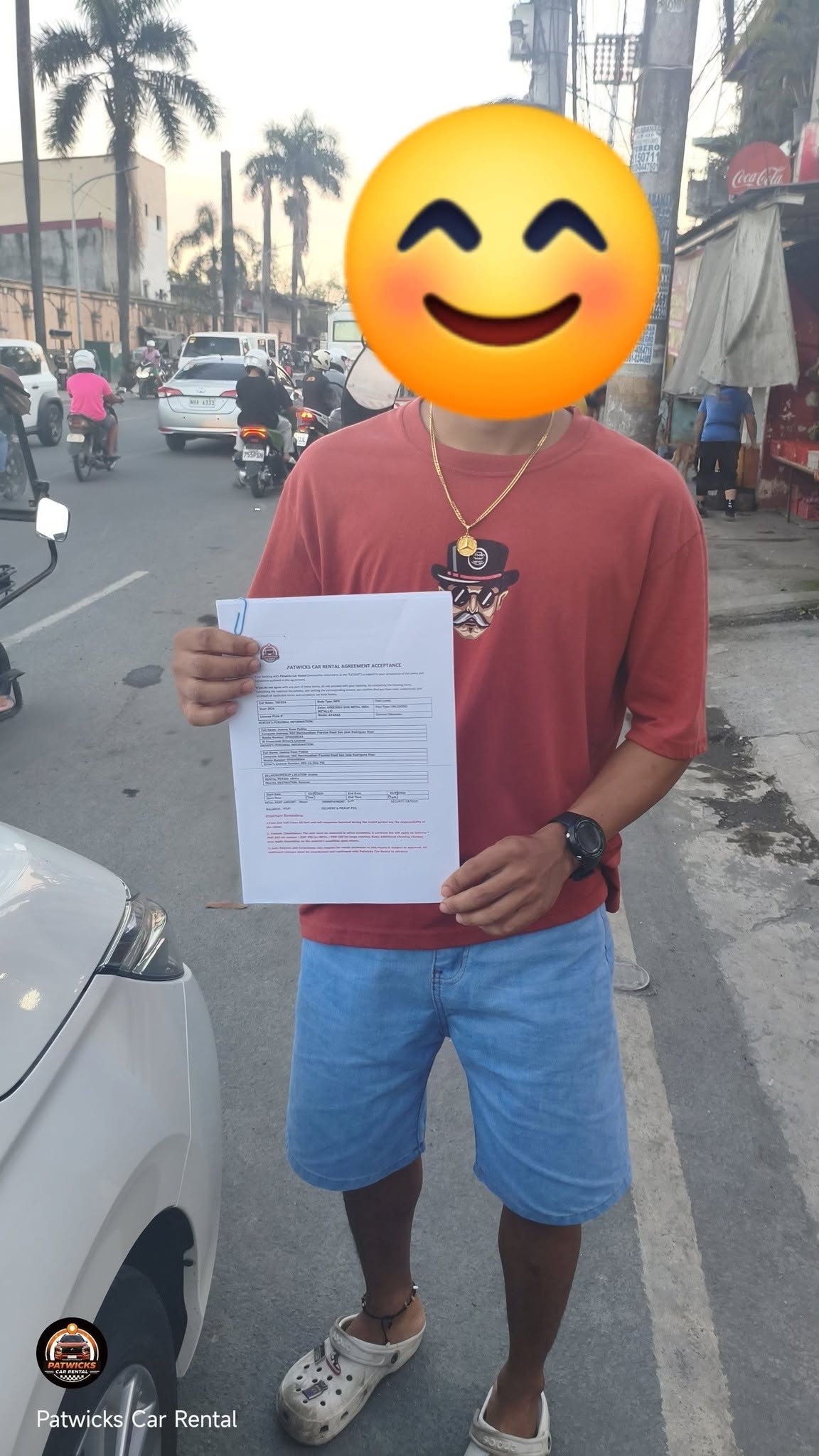 Happy customer with rented vehicle