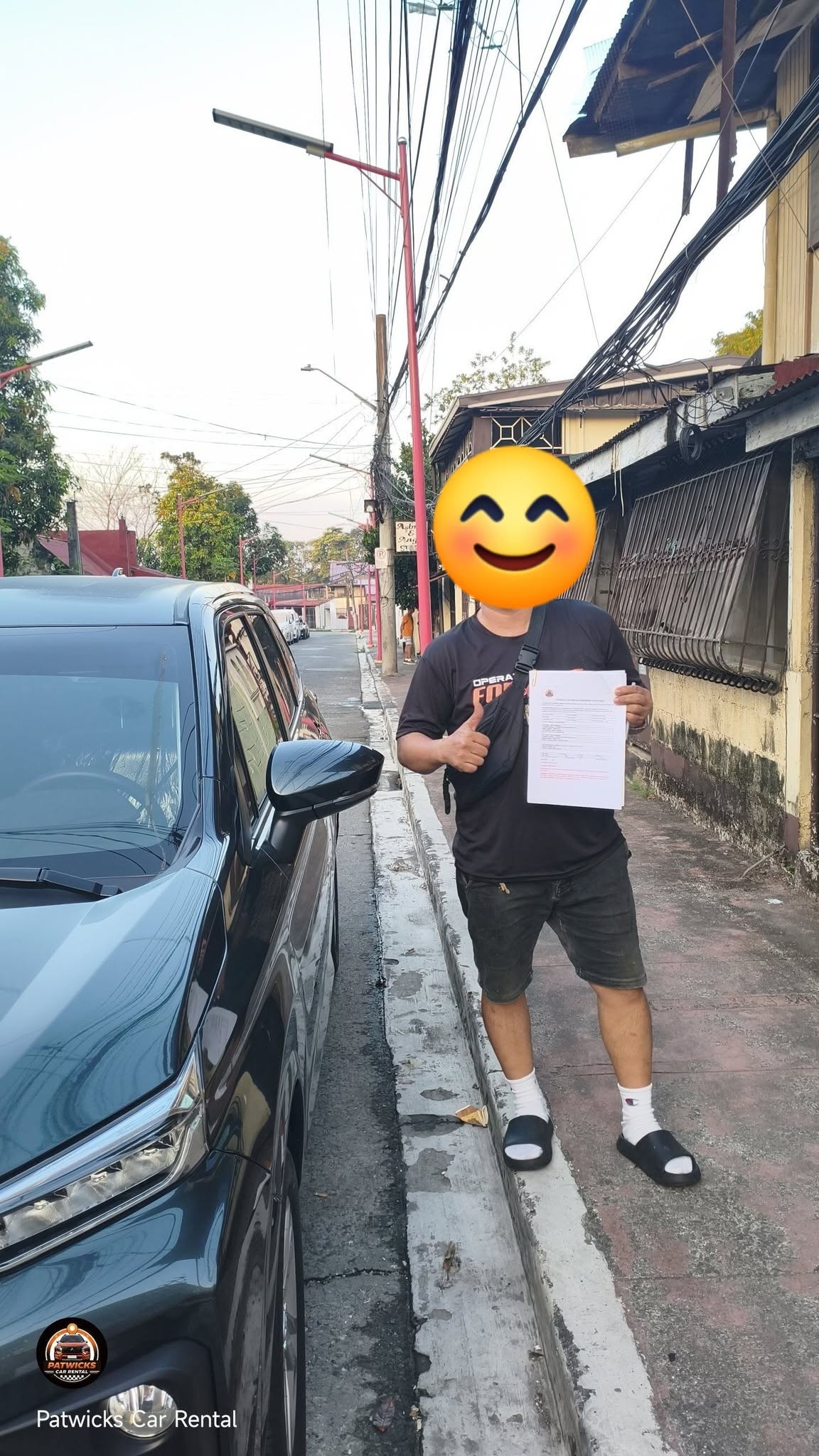Happy customer with rented vehicle